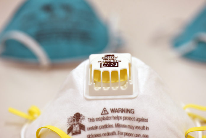 FILE PHOTO: Various N95 respiration masks at a laboratory of 3M, that has been contracted by the U.S. government to produce extra marks in response to the country's novel coronavirus outbreak, in Maplewood, Minnesota